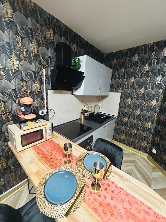 Loveroom 50 nuances de bulles jacuzzi et sauna privatif - Lens14 de Loveroom 50 nuances de bulles jacuzzi et sauna privatif